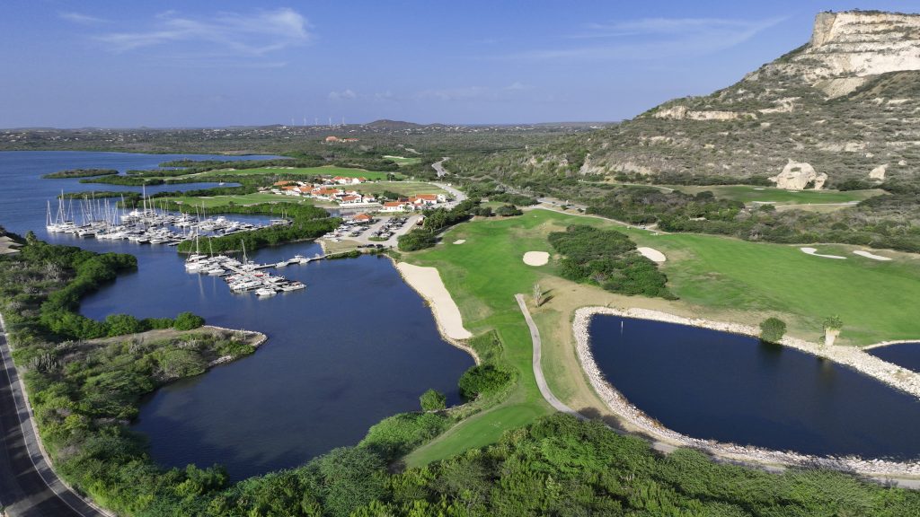 Aerial view of Hole 6 and Hole 14 with marina at Old Quarry Golf Course Curaçao